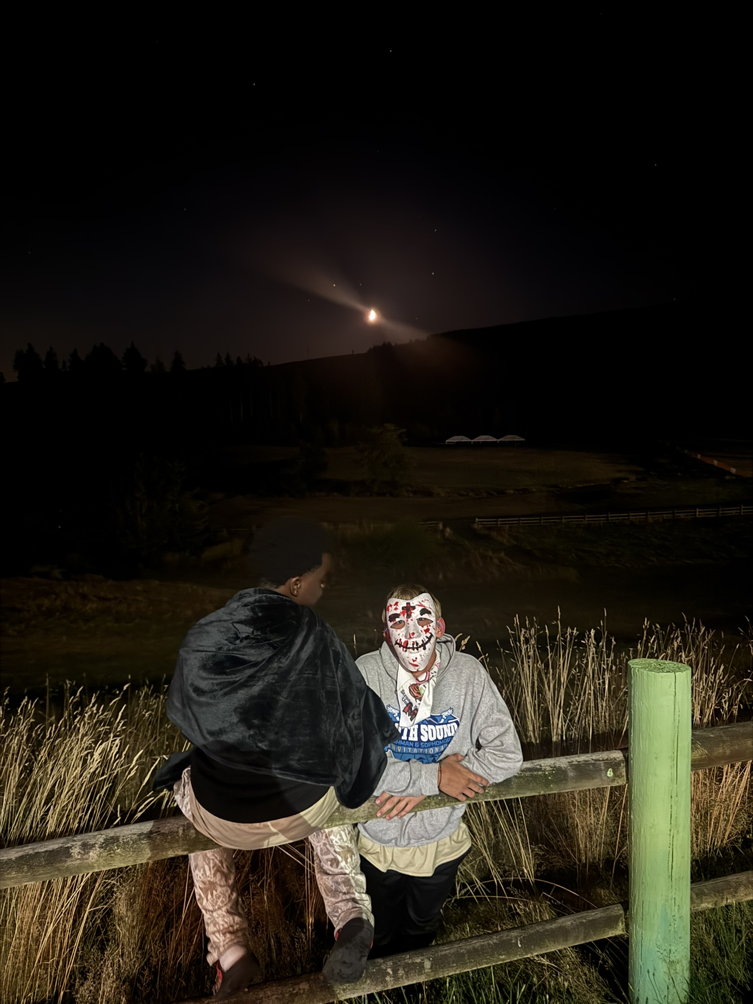 2 boys at night